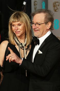 UK, London: American director Steven Spielberg poses with wife Kate Capshaw on the red Carpet at the EE British Academy Film Awards, BAFTA Awards, at the Royal Opera House in London, England, on 14 February 2016.