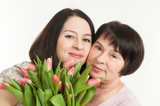 the woman presented a bouquet of flowers for mother