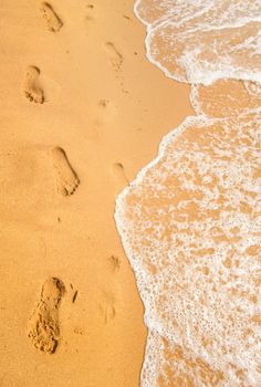 Background of sandy beach and ocean wave