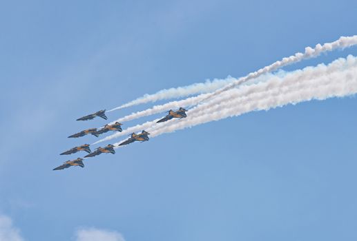 Singapore - February 14, 2016: The ROKAF Black Eagles from South Korea in their T50B Golden Eagles during the Aerobatic Flying Displays at Singapore Airshow at Changi Exhibition Centre in Singapore.