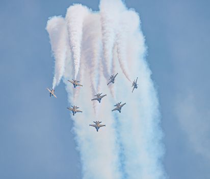 Singapore - February 14, 2016: The ROKAF Black Eagles from South Korea in their T50B Golden Eagles during the Aerobatic Flying Displays at Singapore Airshow at Changi Exhibition Centre in Singapore.