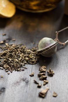 tea composition with cinnamon sticks, lemons