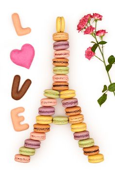 Macarons Eiffel Tower french sweet colorful, Word Love heart, roses. A lot of fresh  pastel delicious biscuit dessert. Love,Valentines Day, romantic. Isolated                             