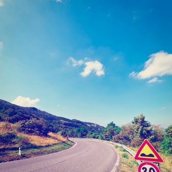 Winding Asphalt Road in the Italian Alps, Instagram Effect