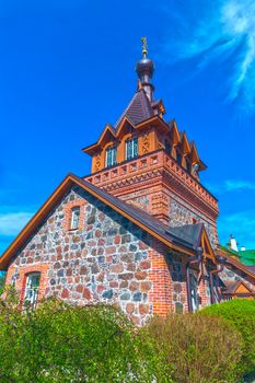 Brick rural Orthodox church in the spring sunny day