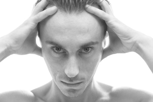 Black-and-white portrait of muscular man isolated on white