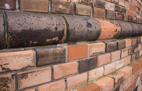 Various shades of the colors of bricks, from orange to dark brown.