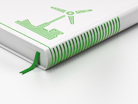 Manufacuring concept: closed book with Green Windmill icon on floor, white background, 3d render