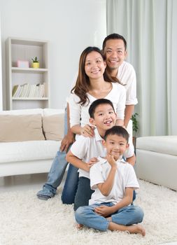 indoor portrait of asian family 