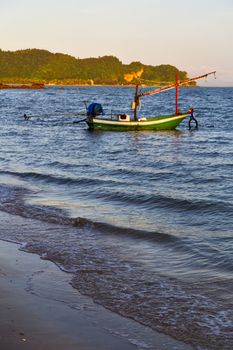 sunrise asia in the  lomprayah bay isle white  beach    rocks  boat   thailand  and south china sea anchor