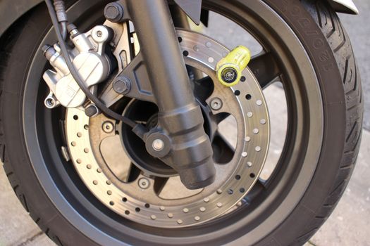 Yellow Disc Lock on Motorbike Disc Brake