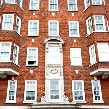 in europe london old red brick wall and          historical window