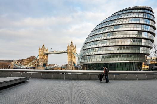 city hall and Thames in modern area in London, UK