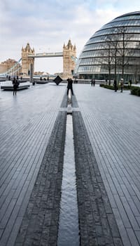 city hall and Thames in modern area in London, UK