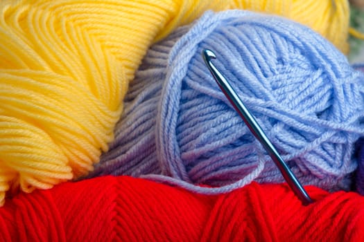 Some yarn with a crotchet needle 