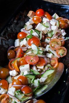 salad with fresh tomatoes cherry cheese and lettuce