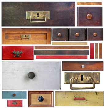 Old drawers, wooden strips and escutcheons on white background