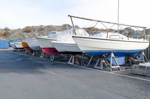 many boat on storage for the winter on the pier