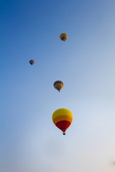 group of hot air balloon floating across the sky