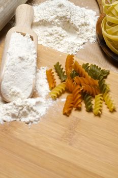 Still life with raw homemade pasta and ingredients for pasta