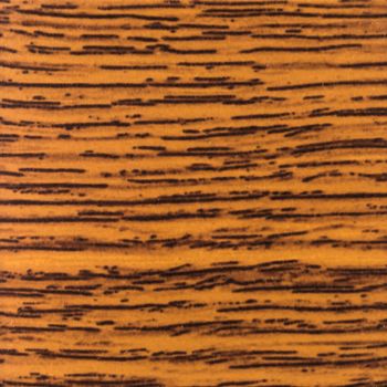 Abstract wood texture with focus on the wood's grain. Mahogany wood