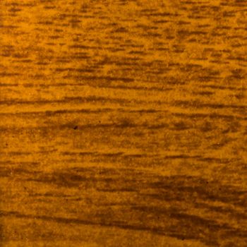 Abstract wood texture with focus on the wood's grain. Teak wood