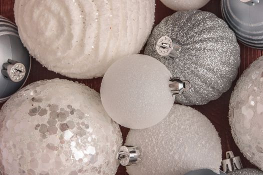 Festive glitter christmas balls decorations. Seasonal winter holidays. Top view with copy space