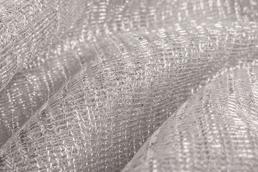 Sparkling metallic textile background for party or fashion design