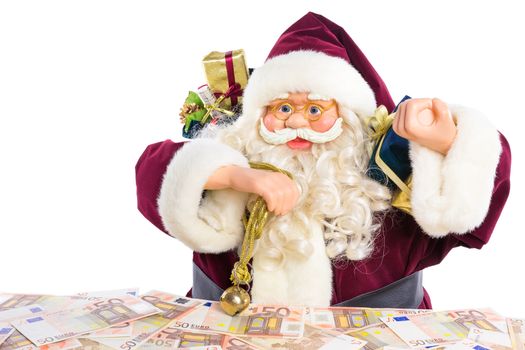 Model of Santa Claus with gifts and euro notes isolated on white background