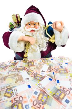 Model of Santa Claus with presents and euro notes isolated on white background