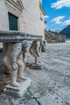 Stone table, which stands on two carved titans, Perast