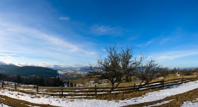 Carpathian mountain valley covered with fresh snow. Majestic landscape. Ukraine, Europe