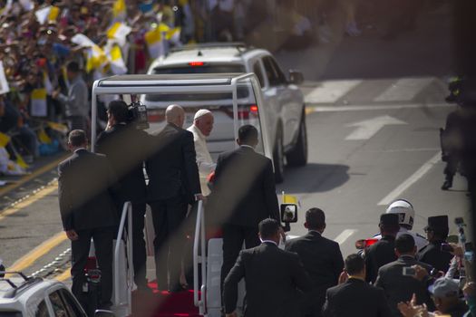 MEXICO, Morelia : Pope Francis waves to the faithful upon his arrival in Morelia, Michoacán, on February 16, 2016. Pope Francis arrived in Mexico's troublesome western state of Michoacan, where the cult-like Knights Templar drug cartel and its pseudo-messianic leader terrorized the population until farmers revolted against them.   