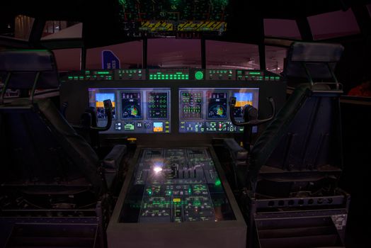 Singapore - February 14, 2016: Singapore made (ST Engineering) mock-up of electronic cockpit for retrofitting to Lockheed C-130 Hercules at Singapore Airshow at Changi Exhibition Centre in Singapore.