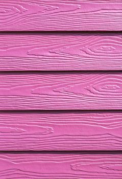 Closeup pattern and  texture of pink wooden background