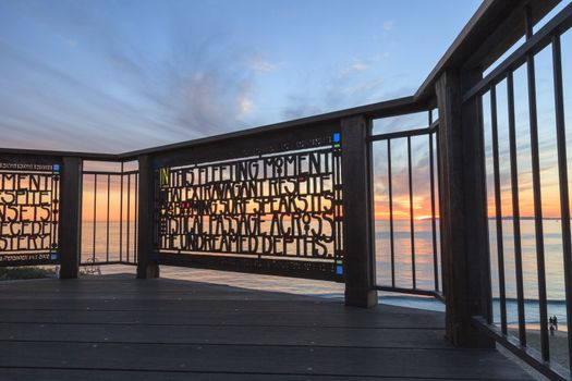 Stained glass fence at Browns Park in Laguna Beach, California at sunset.