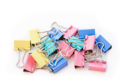 Binder clips on white background.
