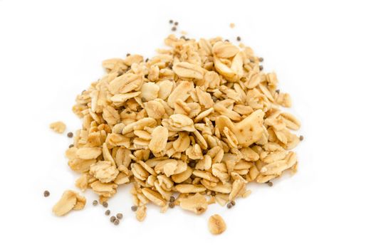 Pile of granola cereal on white background.