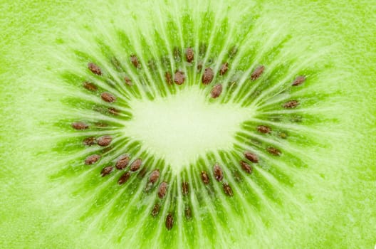 Close up on center Kiwi fruit as background.