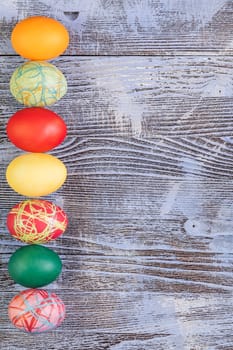 Easter eggs on wooden background