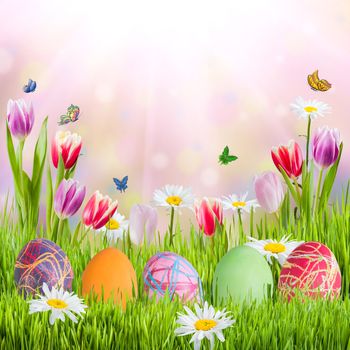 Easter holiday background with eggs and flowers