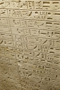 FLORENCE, ITALY - SEPTEMBER 20, 2015 : Close up detailed view of egyptian tablet inscriptions with hieroglyphic signs exhibited in Florence Archeology Museum.
