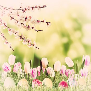 Easter vintage nature holiday background with eggs and flowers