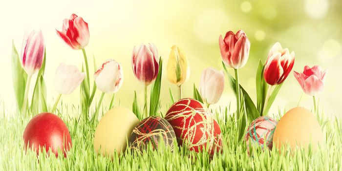 Easter vintage nature holiday background with eggs and flowers