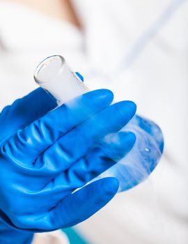 chemical reagent a test tube in the hand