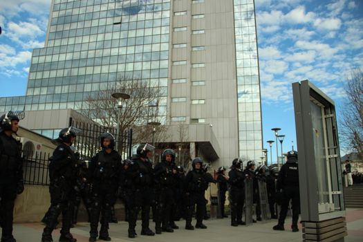 KOSOVO, Pristina: Riot policemen stand as thousands gather in Pristina on February 17,2016 for a major anti-government rally to mark their eighth anniversary of independence from Serbia.After a morning of official celebrations in the capital Pristina, including a military parade, demonstrators arrived for what opposition parties expected to be a record-breaking protest calling for the government's resignation and early elections.
