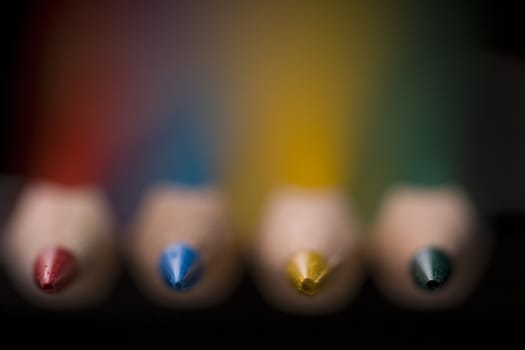 Group of colored pencils with shallow depth of field photographed from the top