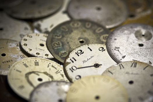 Horizontal top view of a set broken hand watches 
