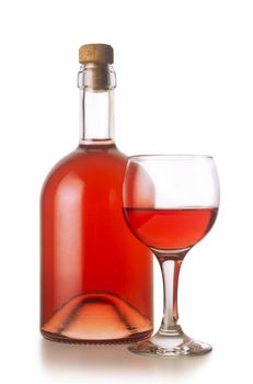 Small rose wine bottle with cork near a glass with rose wine. Isolated on white background.