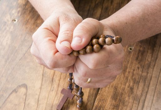 Woman with Rosary Beads in Her Hands